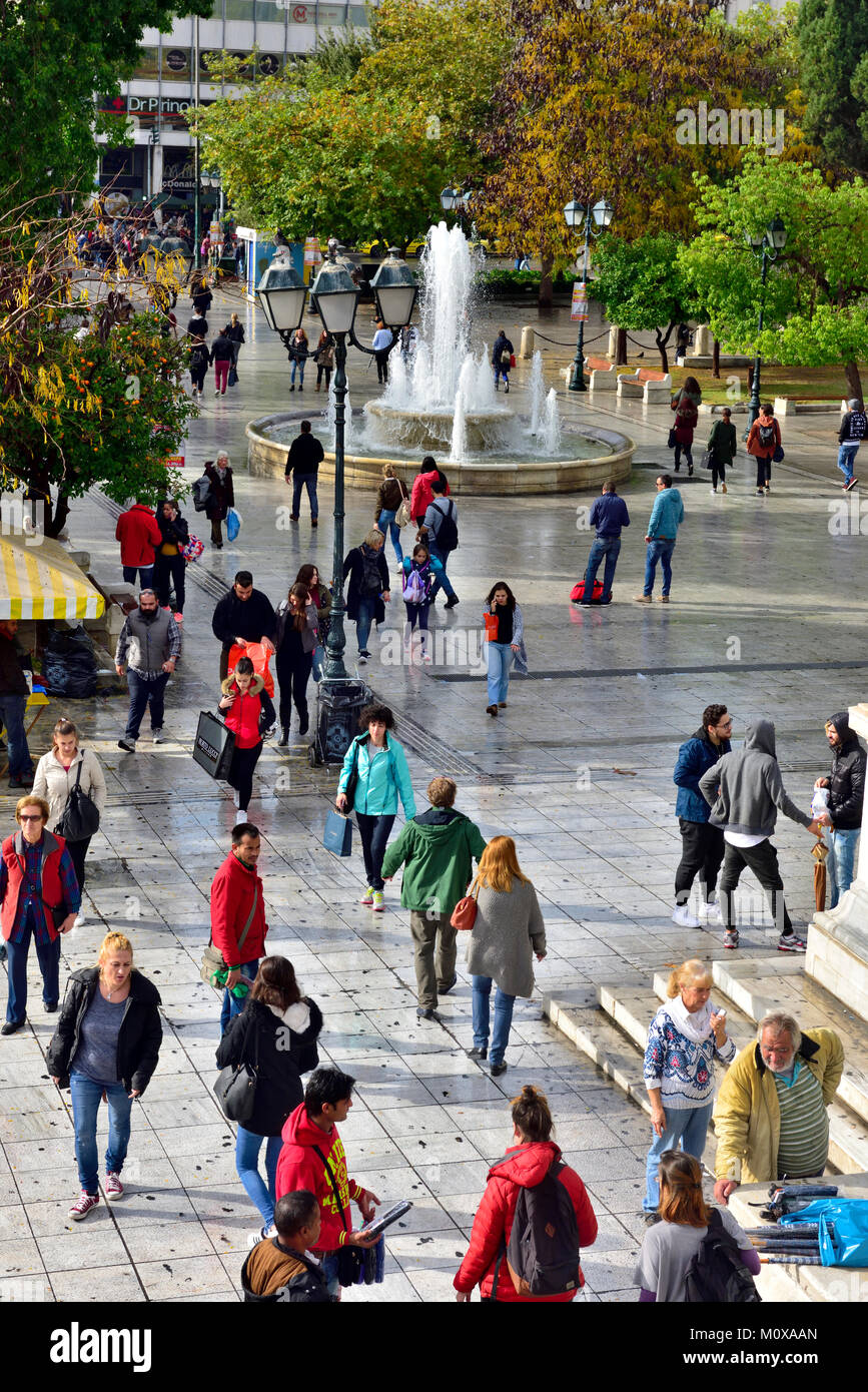 People walking in Syntagma Square, Athens, Greece Stock Photo