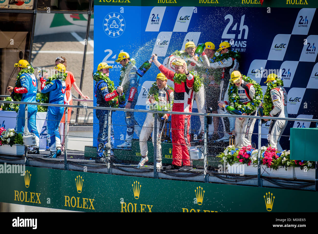 Trophy presentations & Champagne spraying on the podium for the Winners of the 2017 24 Hours Le Mans at Circuit de la Sarthe on Sunday 18 June 2017. Stock Photo