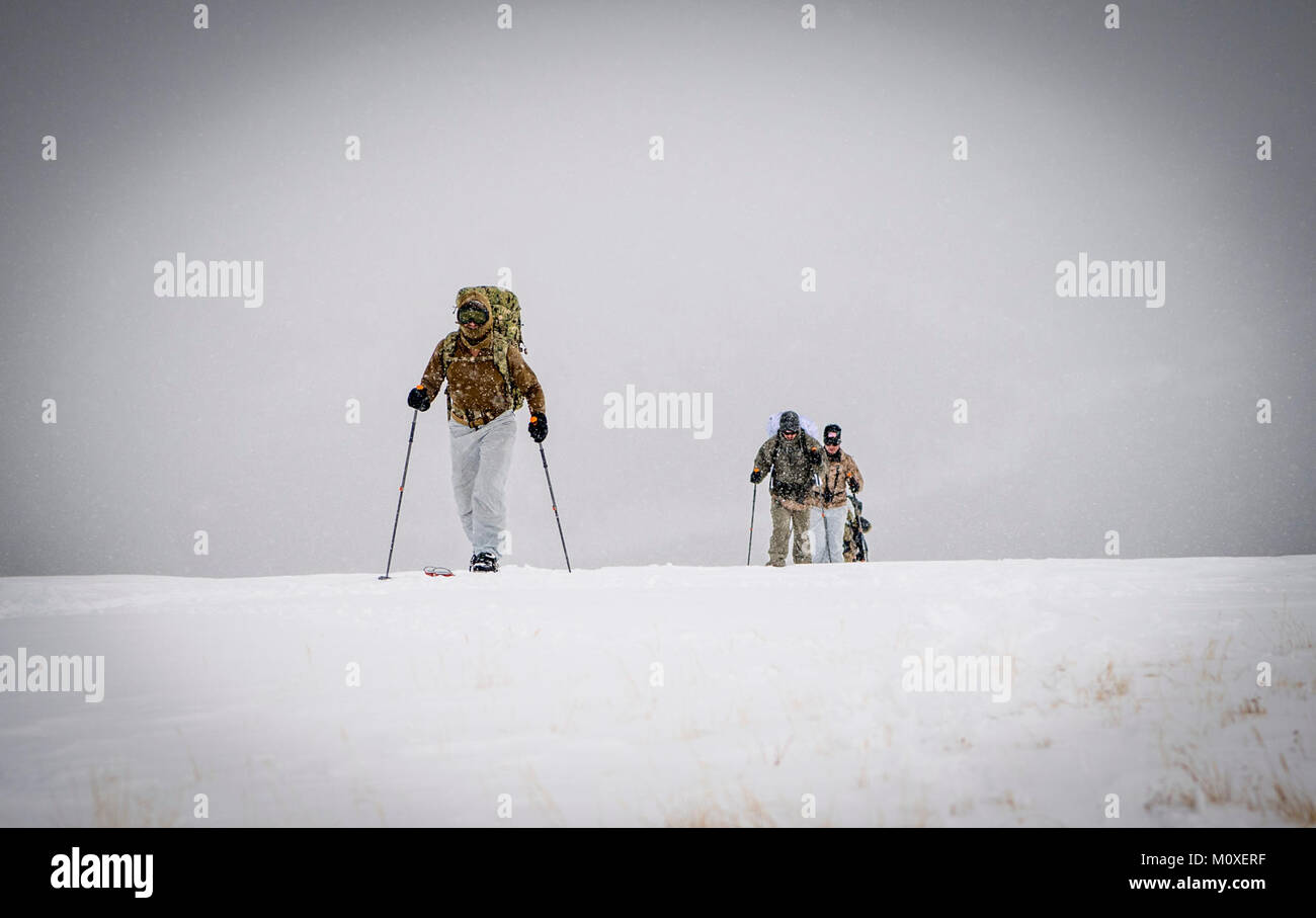 East coastbased Navy SEALs a trail in the backcountry using skis