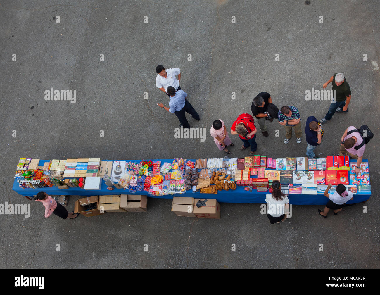 Tourists buying souvenirs in a shop on the Pyongyang kaesong highway ...