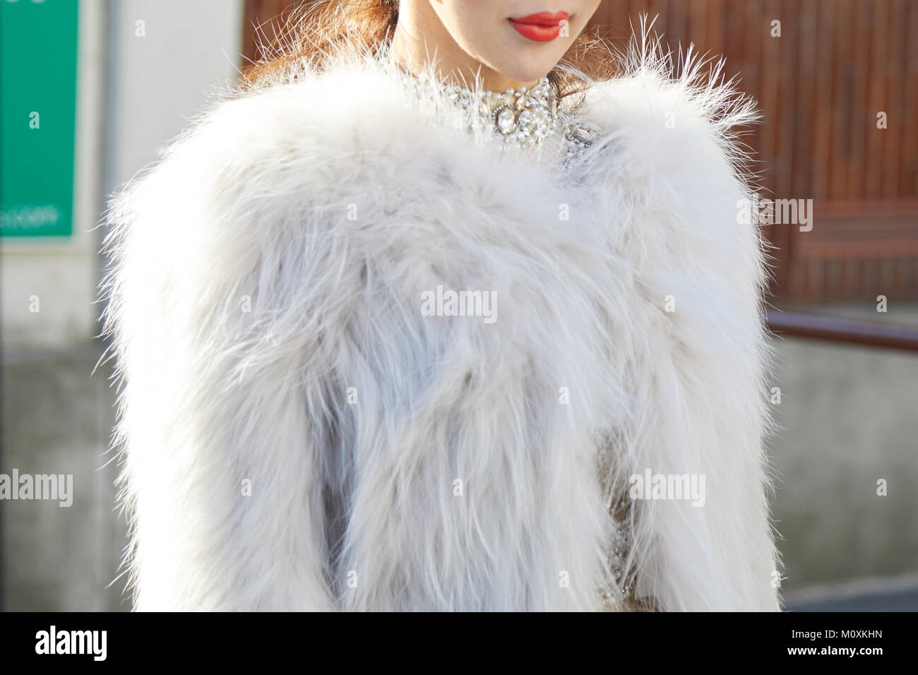white feather coat