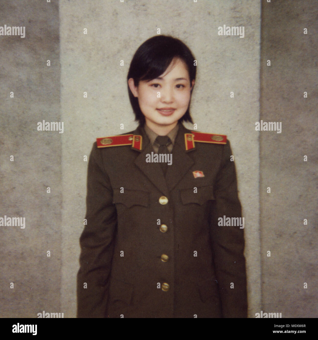 Polaroid of a North Korean guide called Kim at the victorious fatherland liberation war museum, Pyongan Province, Pyongyang, North Korea Stock Photo