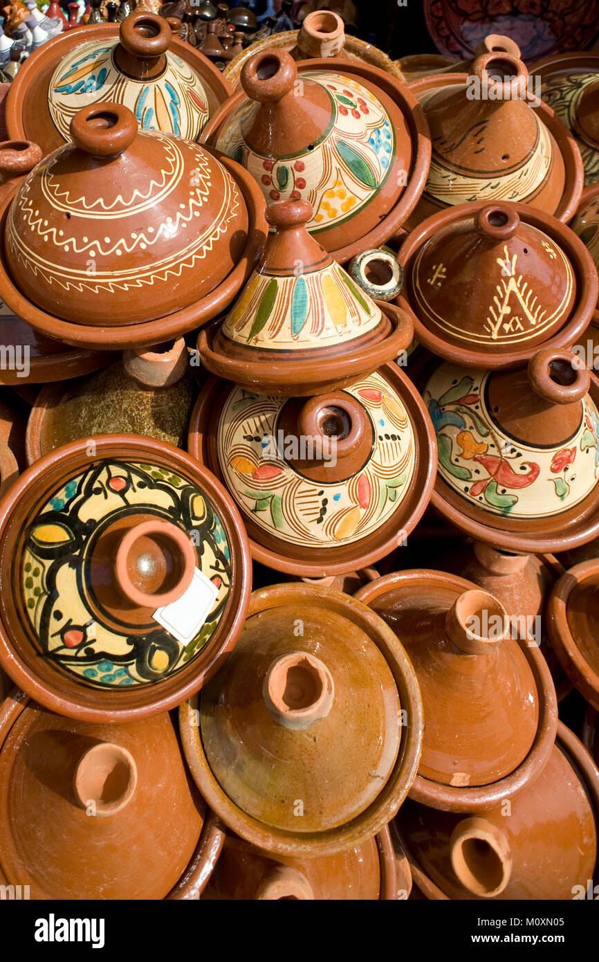 Selection of colorful Moroccan tajines. Traditional dish, meat and vegetable in ceramic tajine. Stock Photo