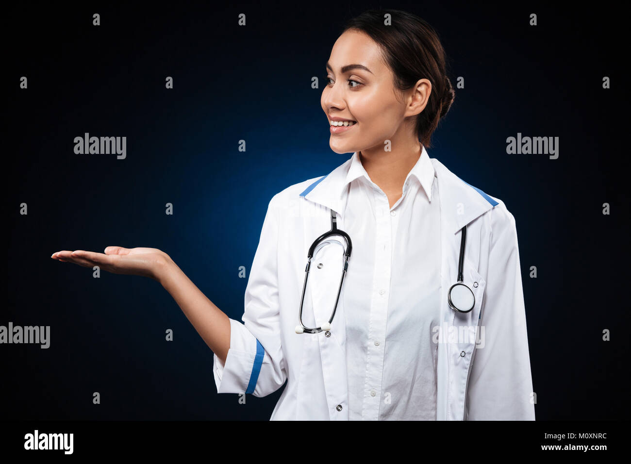 Positive brunette lady doctor hi-res stock photography and images - Alamy