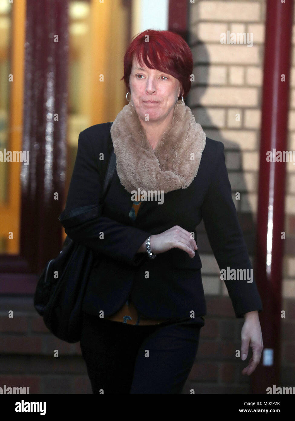 Tracy Lewis the sister of Sean Benton leaves Woking Coroner's Court after giving evidence on the first day of the inquest into the 1995 death of Private Benton at Deepcut army barracks. Stock Photo