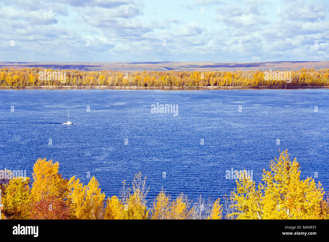 Photo of autumn landscape with yacht Stock Photo