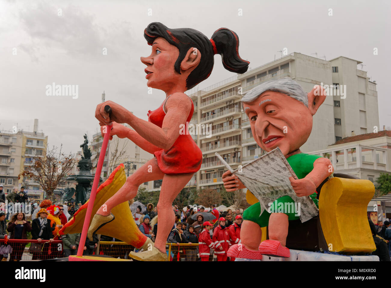 Patras carnival pasrade 2017-Reading the news Stock Photo - Alamy