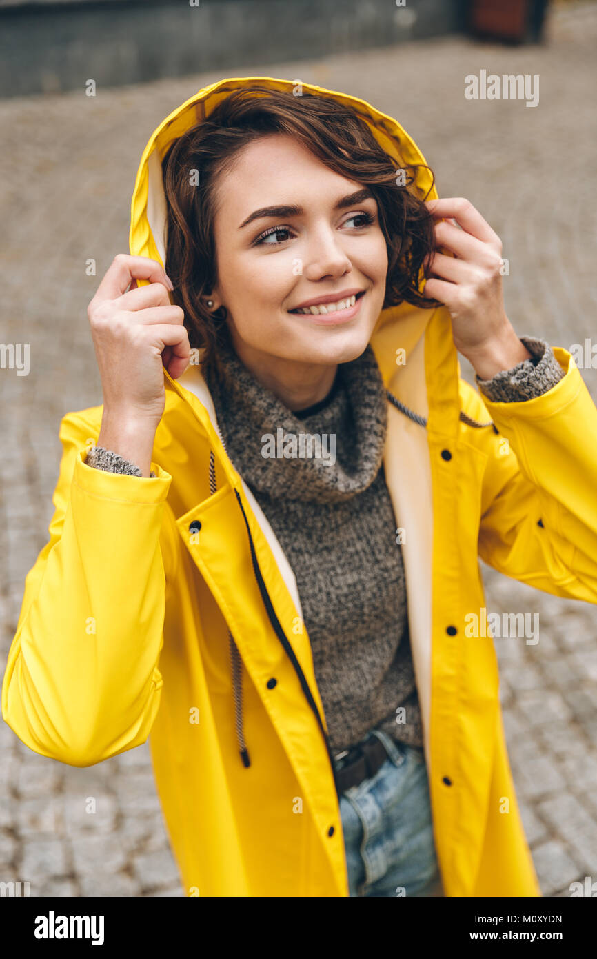 Yellow raincoat hi-res stock photography and images - Alamy