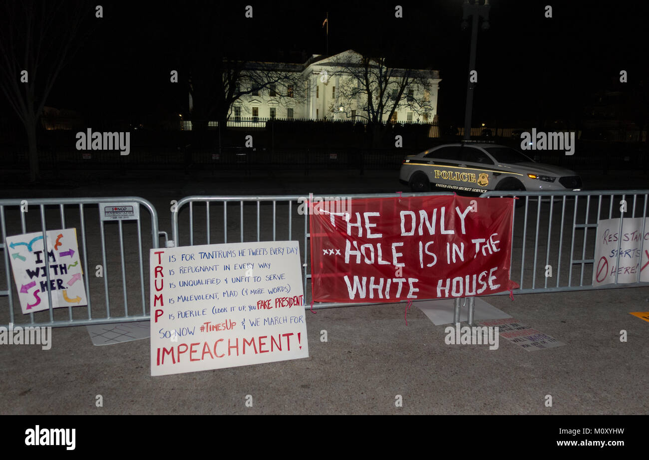 Emphatic protest signs at White House after day of protests, rally and march; 1st anniversary of Women's March on Washington. Jan. 20, 2017. Stock Photo