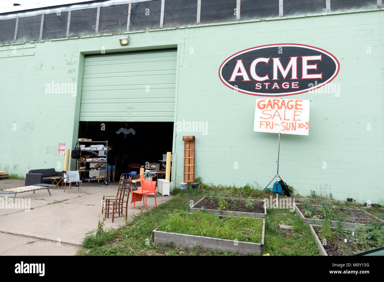 Sign Advertising A Garage Sale In A Large Commercial Building With