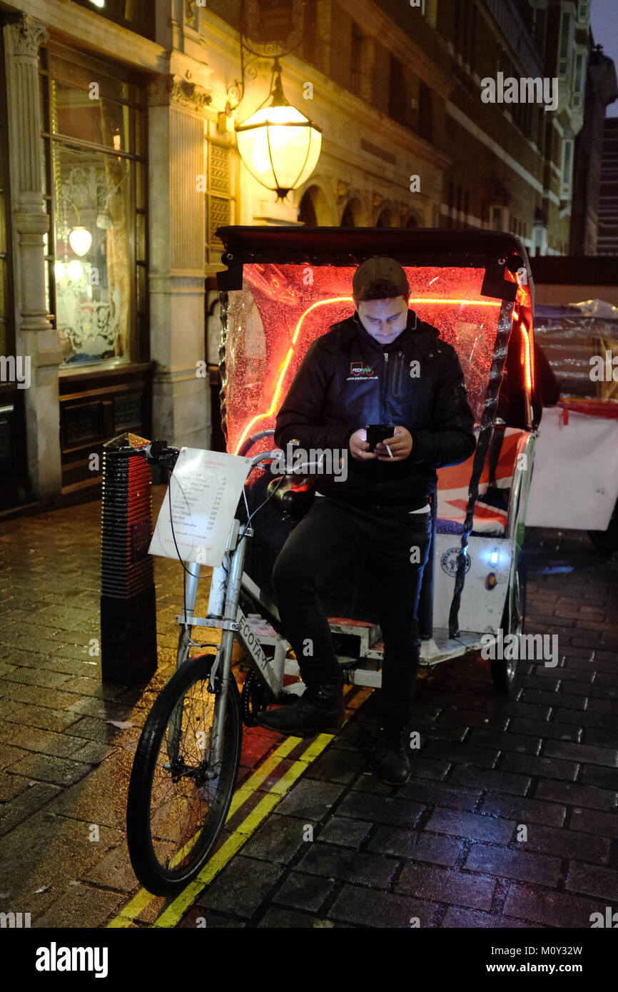 The Rickshaw Rider Rickshaw rider waiting for customers in London, England, UK Stock Photo ...