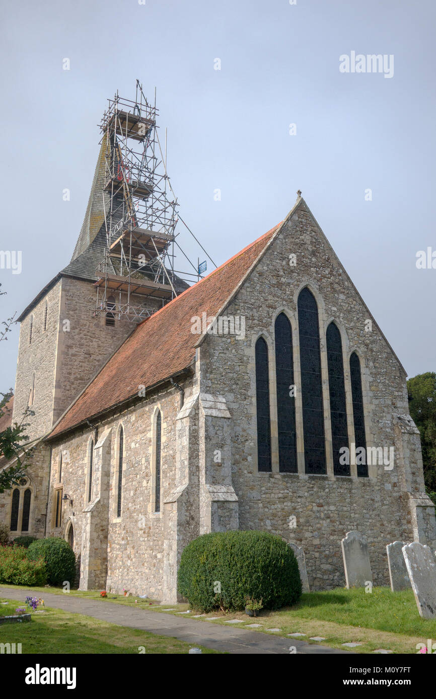 Scaffolding on a church tower, The Priory Church of St. Mary, Hayling Island, Hampshire, UK Stock Photo