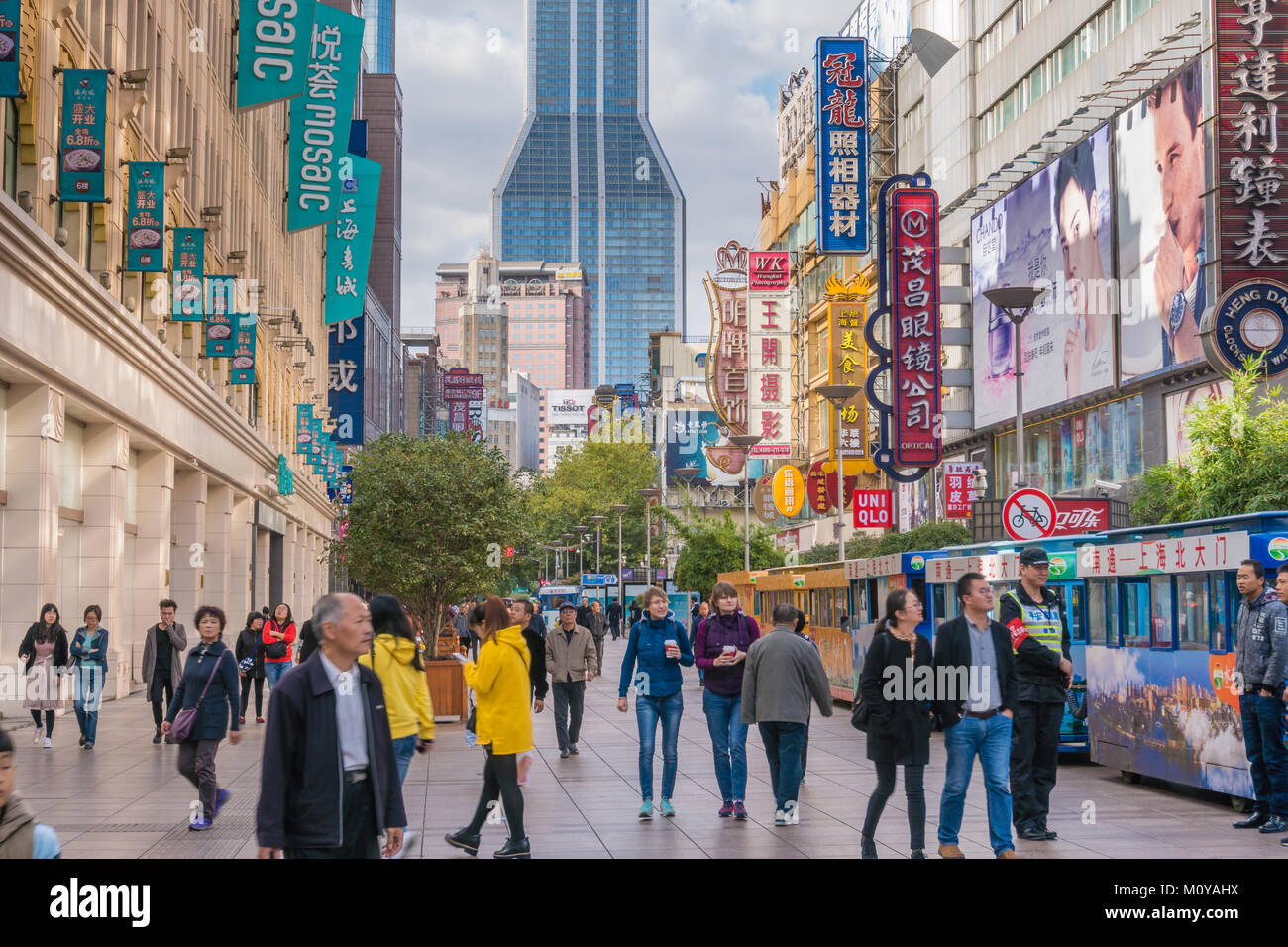 People visiting the Nanjing Road shopping street in Shanghai Stock Photo