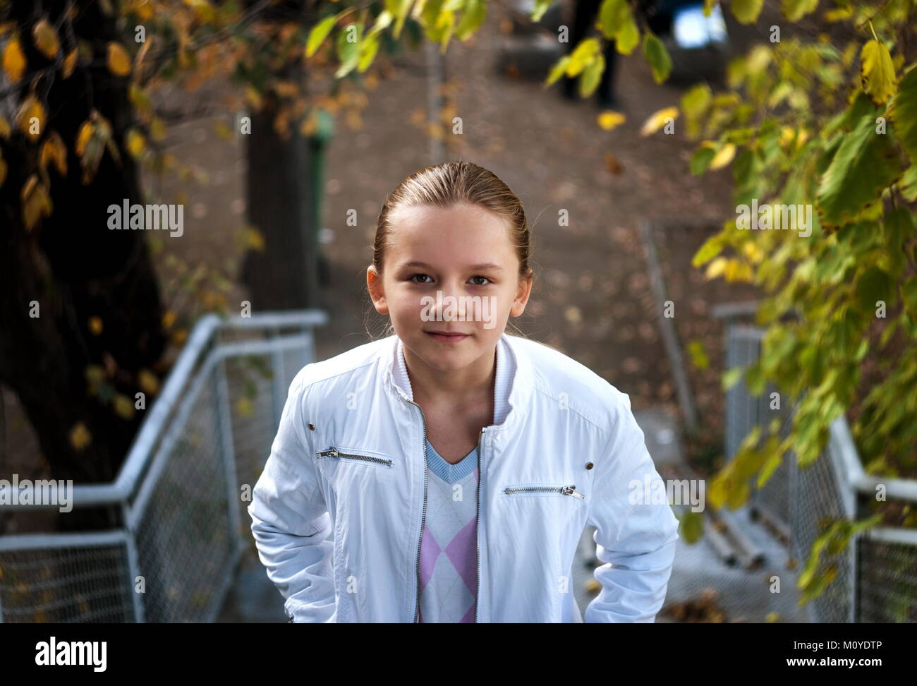 Girl in the autumn park Stock Photo - Alamy