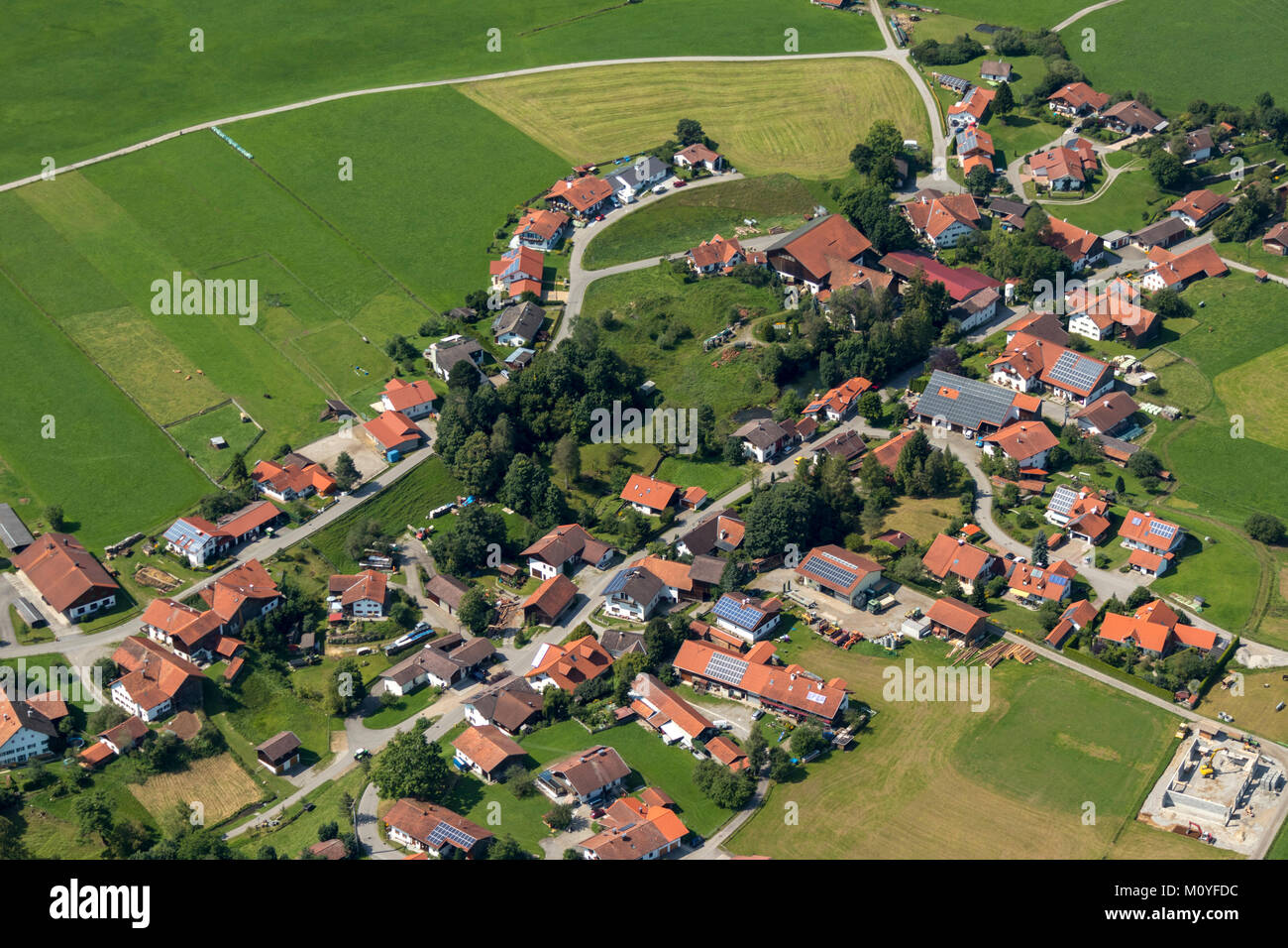 Aerial view of houses with solar panels in Urspring 86989 Steingaden, Bavaria, Germany Stock Photo
