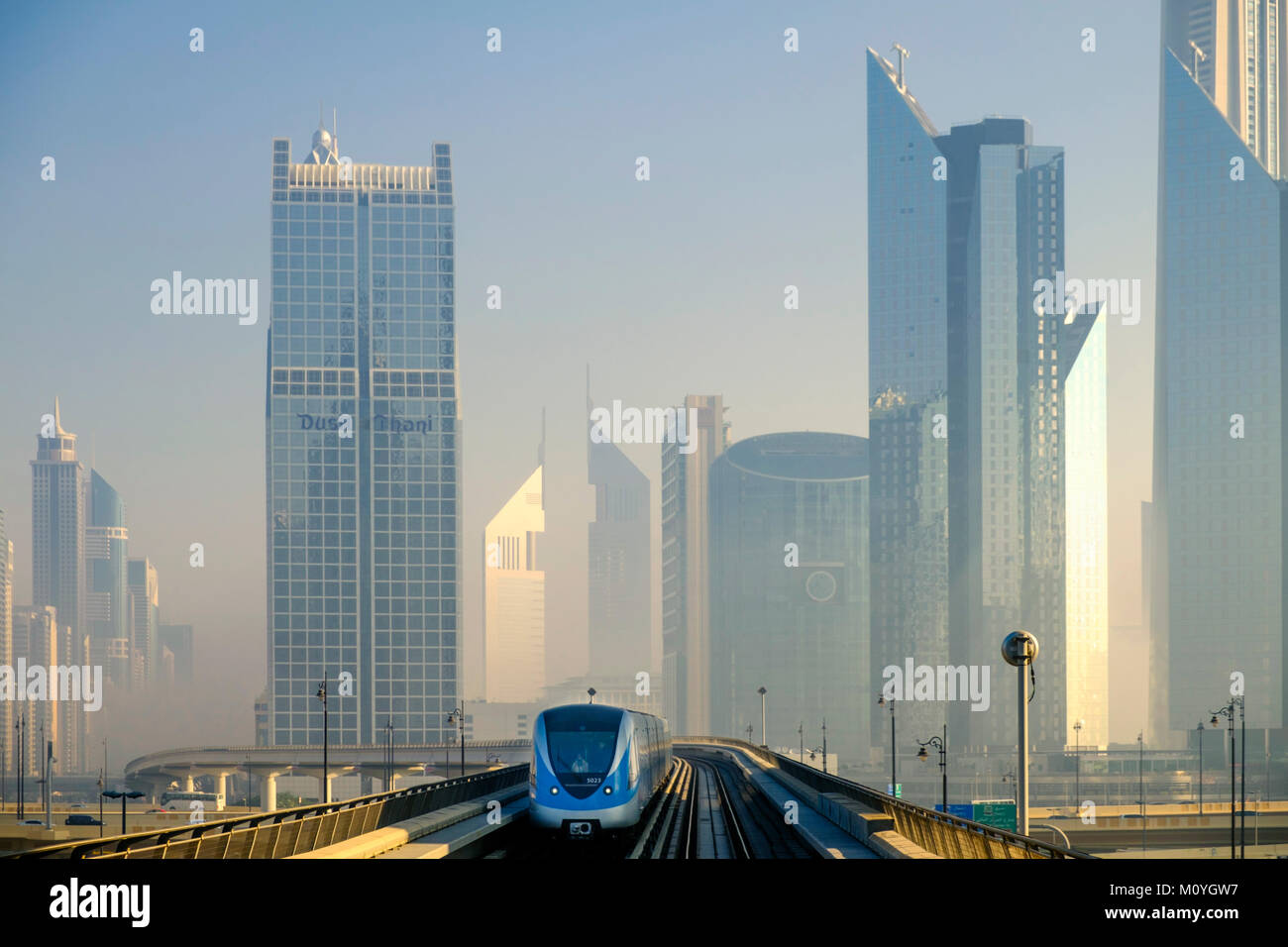 Dubai metro with skyscrapers on either side, city centre, downtown, CBD, Dubai, United Arab Emirates Stock Photo