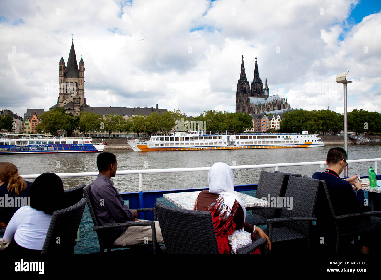 Germany, Cologne, view from a ship to the Romanesque church Gross St. Martin and to the cathedral.  Deutschland, Koeln, Blick von einem Schiff zur Kir Stock Photo