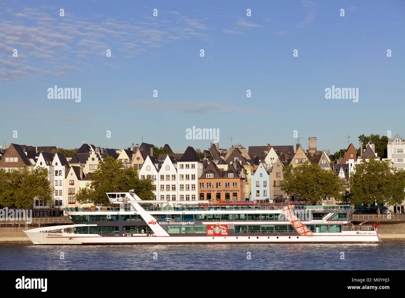 Germany, Cologne, view across the river Rhine to old part of the town,  ship of the ship cruise company Koeln-Duesseldorfer Deutsche Rheinschiffahrt A Stock Photo