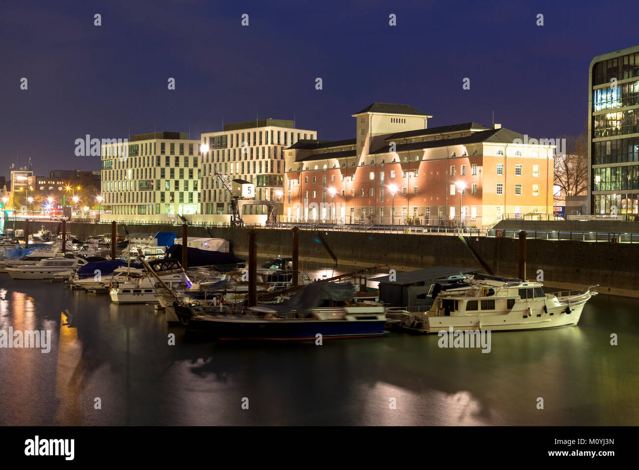 Germany, Cologne, the buildings Pier 15, headquarter of the ifb AG and the Kunsthaus Rhenania building at the Rheinau harbour.  Deutschland, Koeln, di Stock Photo