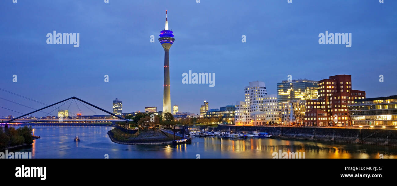 Media harbour with Rhine tower and Gehry buildings at dawn,Düsseldorf,North Rhine-Westphalia,Germany Stock Photo