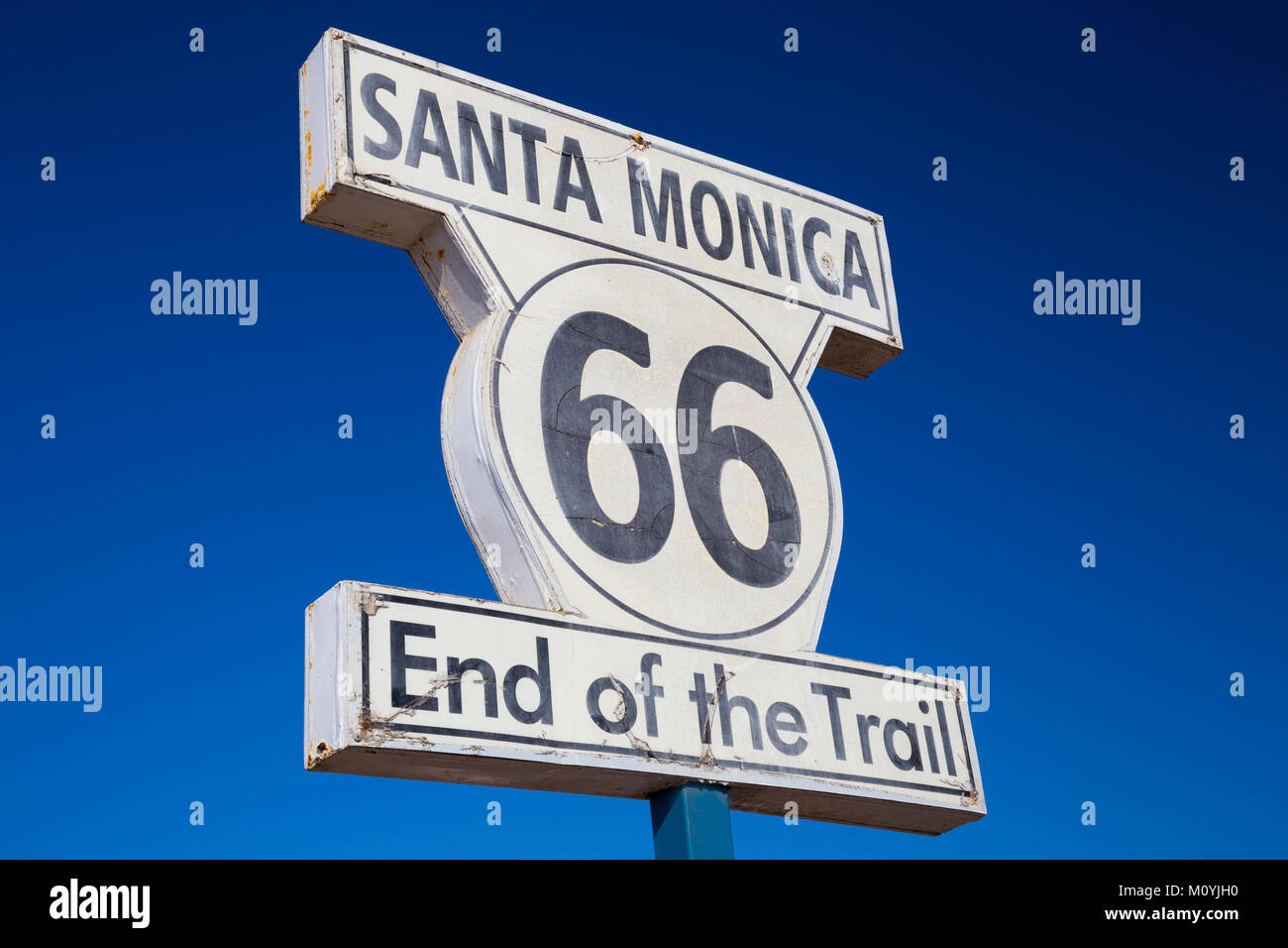 Sign on Santa Monica Pier marking the end of Route 66 Highway, California, United States Stock Photo
