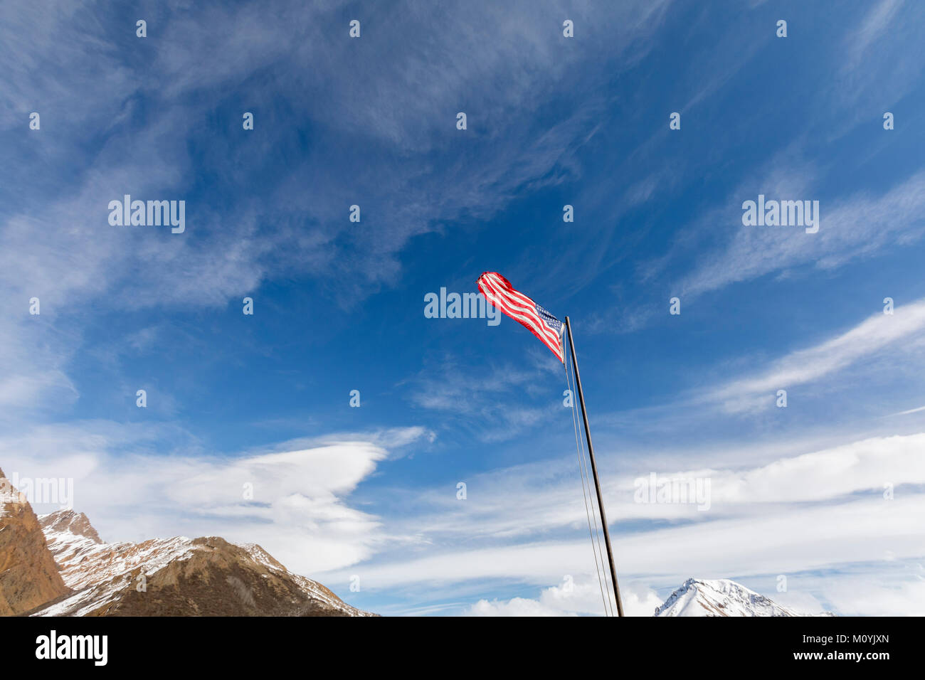 American flag near mountains Stock Photo