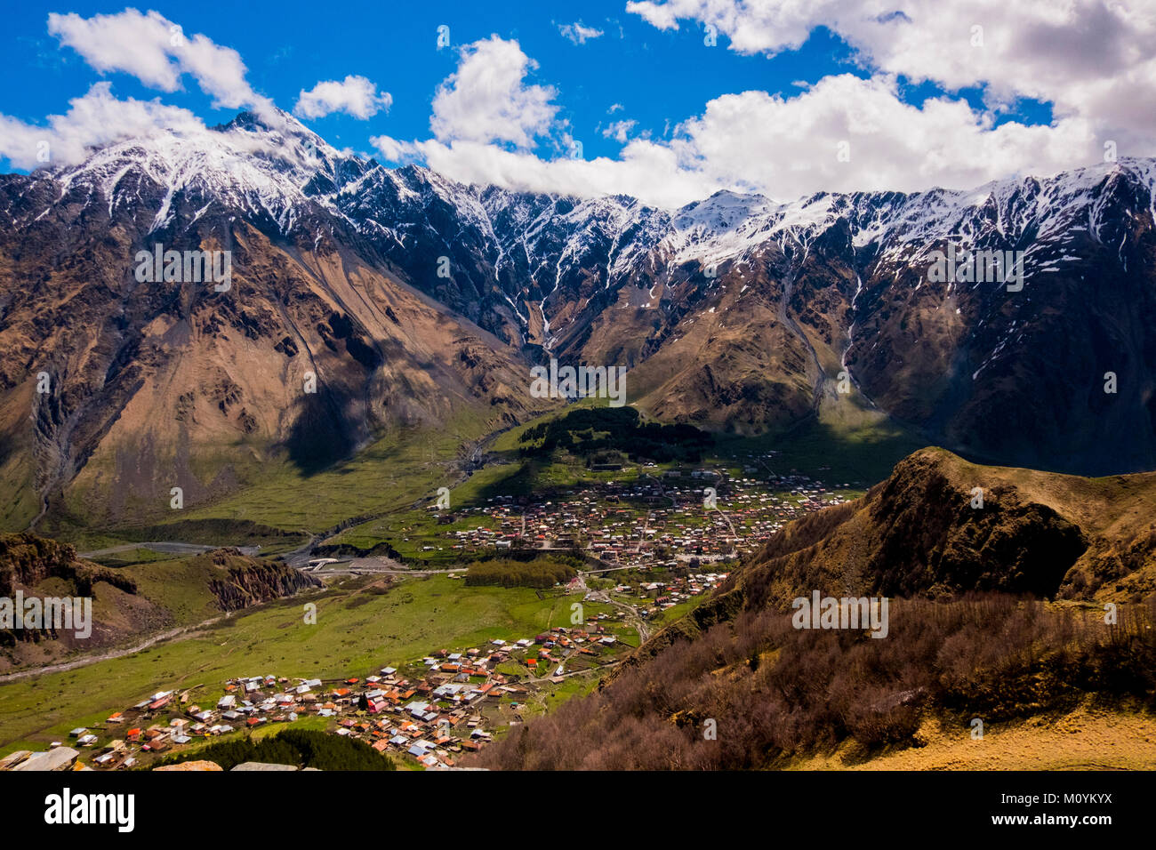 Scenic view of village in valley Stock Photo