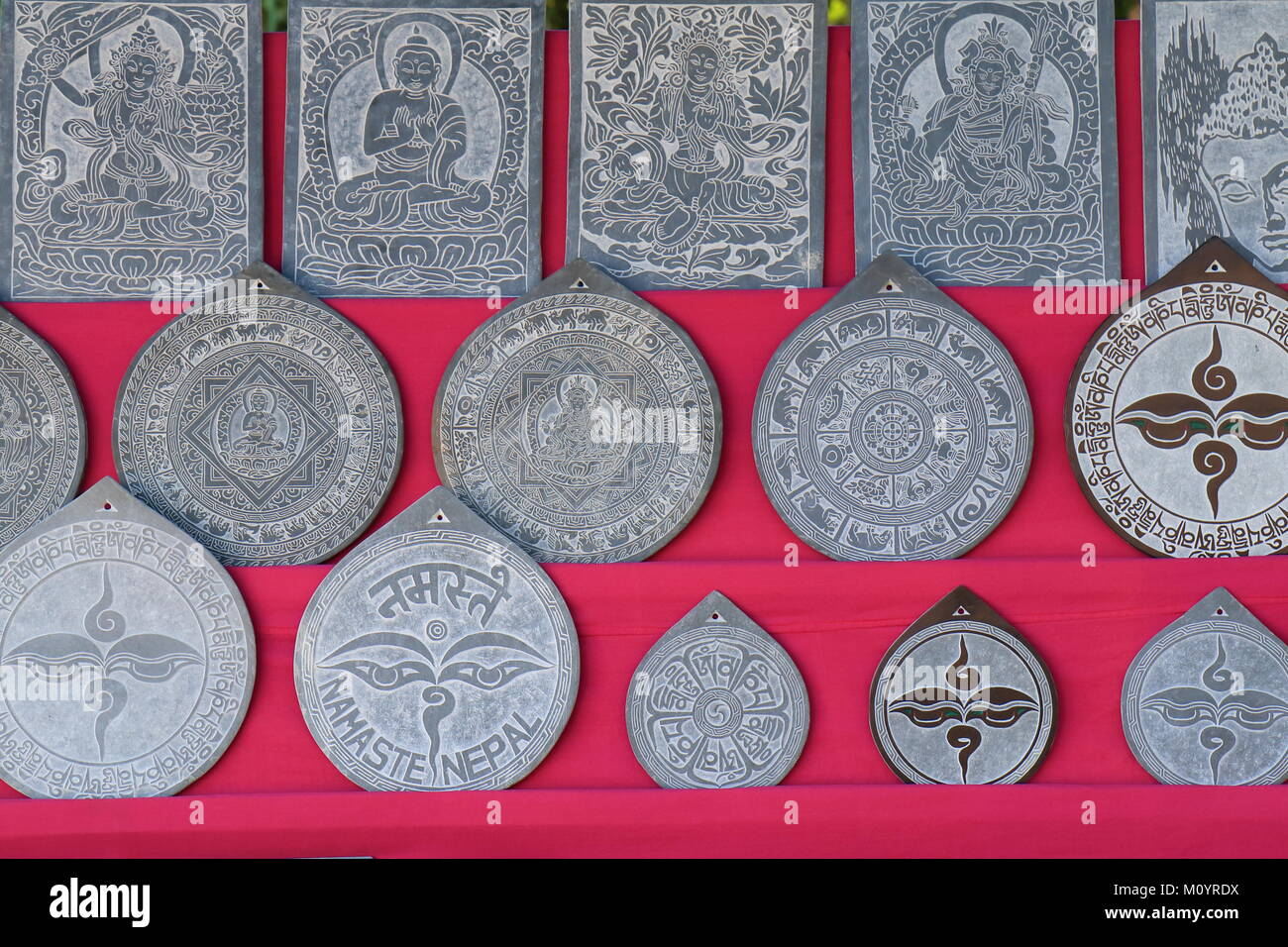 Souvenir shop displays stone carving plates in Kathmandu Nepal Stock