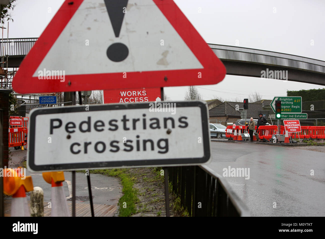 Road works pictured on the A27 in Chichester, West Sussex. Work to a pedestrian footbridge has brought in temporary traffic lights causing delays. Stock Photo