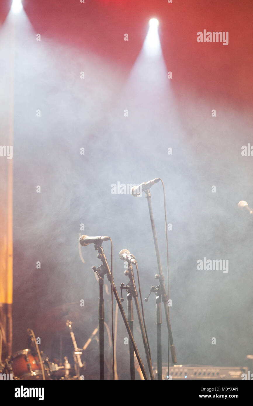 microphones standing on the stage - concert Stock Photo