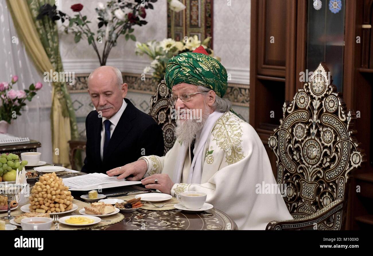 Ufa, Russia. 24th Jan, 2018. The Chief Mufti of Russia Talgat Tadzhuddin, right, sits with the head of Bashkortostan republic Rustem Khamitov during a tea with Russian President Vladimir Putin at the First Ufa Cathedral Mosque January 24, 2018 in Ufa, Russia. Credit: Planetpix/Alamy Live News Stock Photo