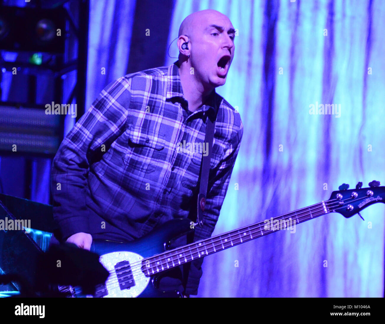 Green Bay, Wisconsin, USA. 24th Jan, 2018. Bassist Aaron Bruch of the band Breaking Benjamin performs at the Resch Center in Green Bay, Wisconsin. Ricky Bassman/CSM/Alamy Live News Stock Photo