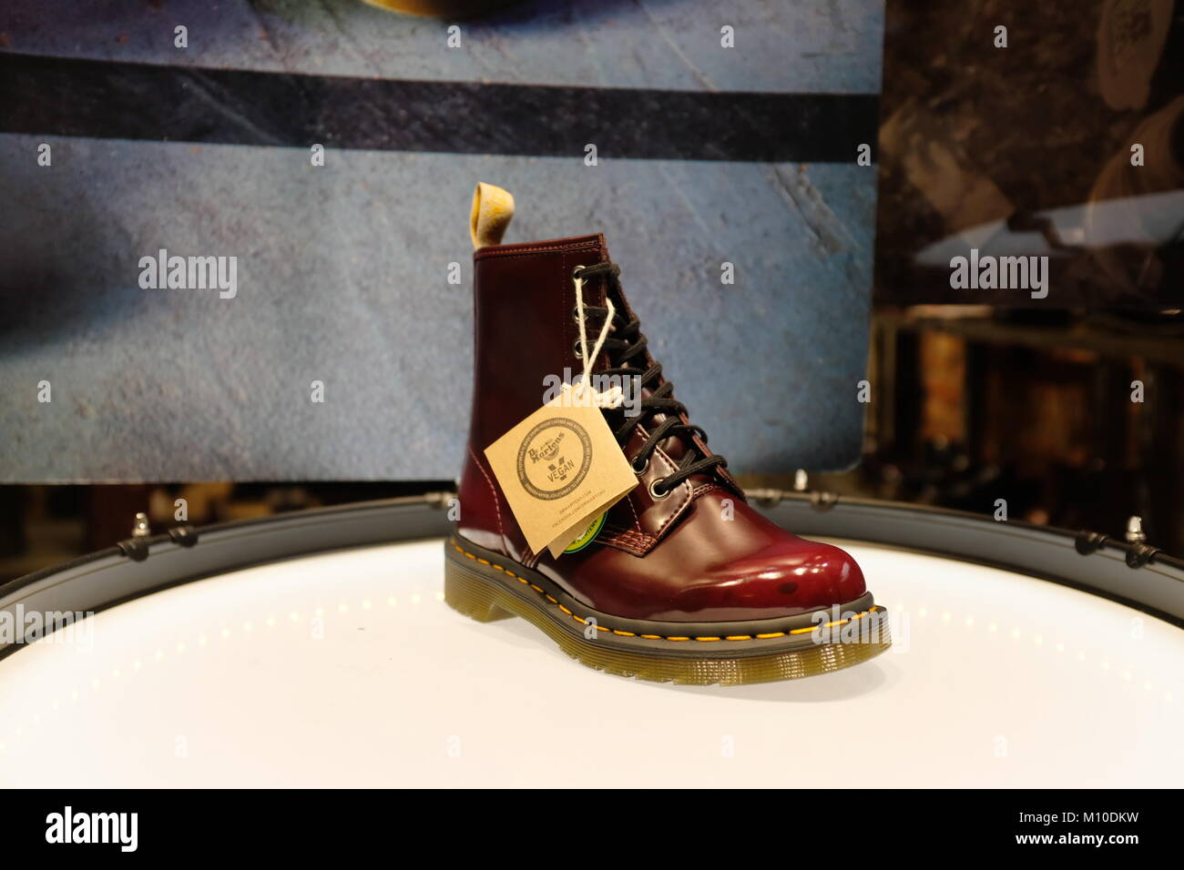 Dr Martens burgundy boot on display in shop window, Carnaby street, London, England, UK Stock Photo