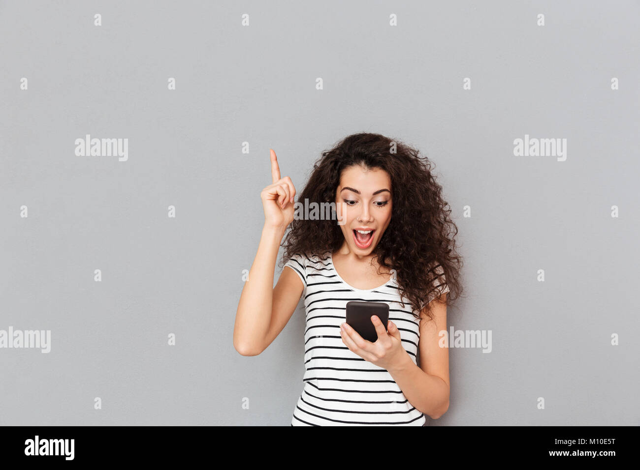 Woman index finger remember hi-res stock photography and images - Alamy