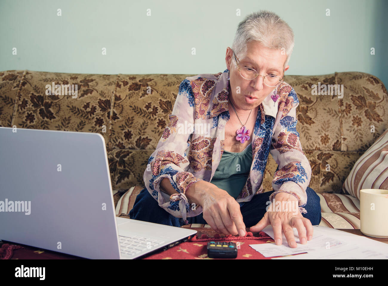 Grandma can't afford to pay her bills Stock Photo