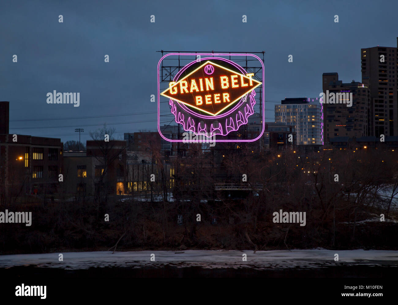 The iconic 1941 Grain Belt Beer sign in shades of neon purple in Minneapolis, Minnesota - The color purple is to recognize the NFL Minnesota Vikings f Stock Photo