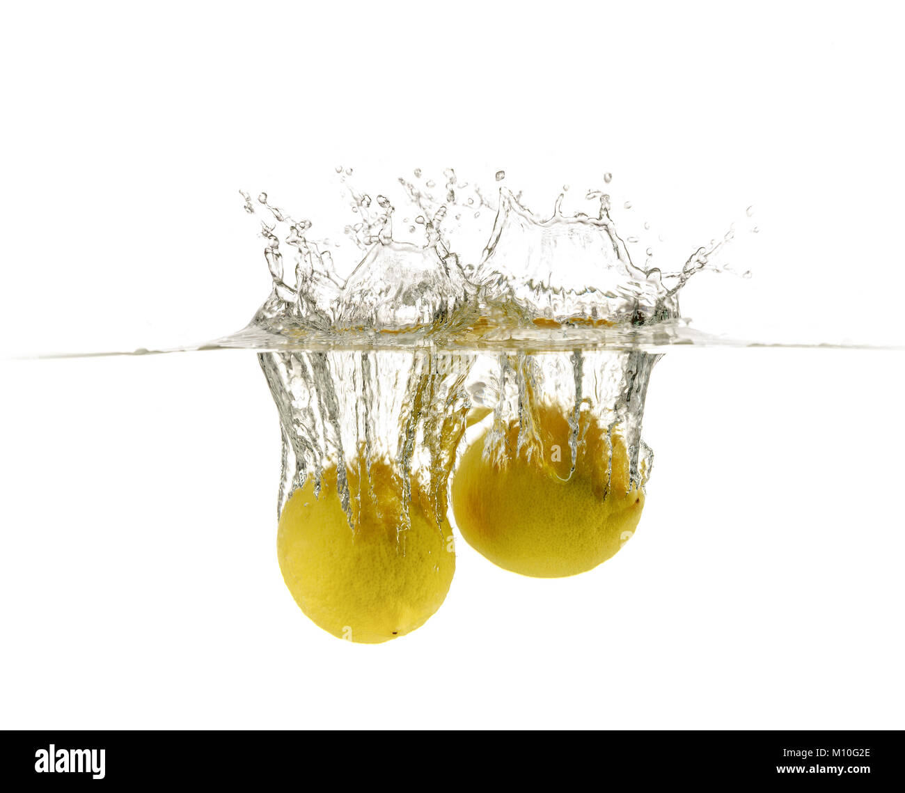 Lemon drop in fizzy sparkling water, juice refreshment Stock Photo Alamy