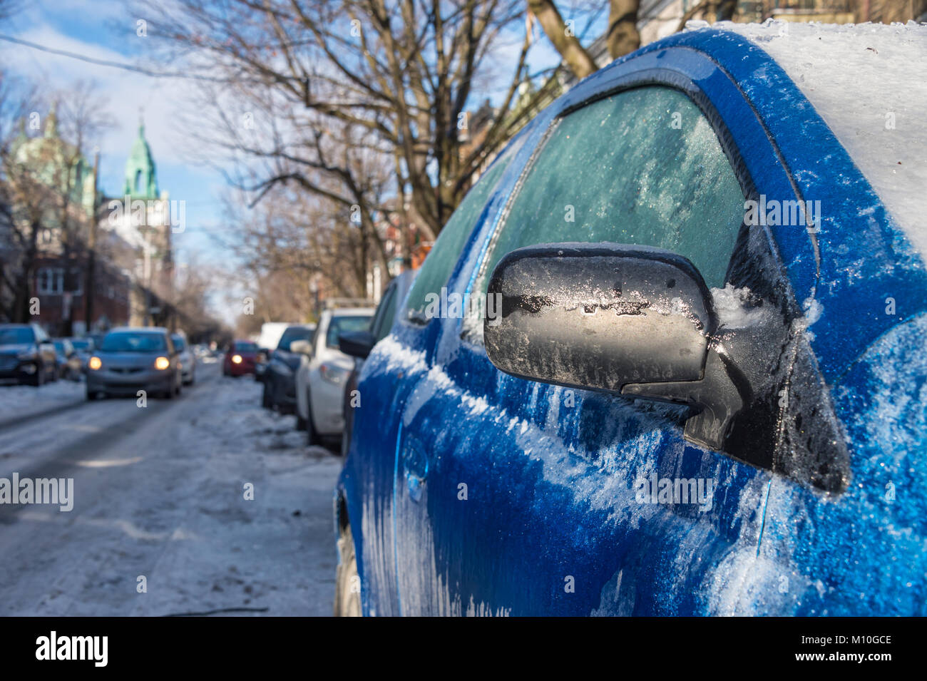 Thick layer of ice covering car after freezing rain in Montreal, Canada