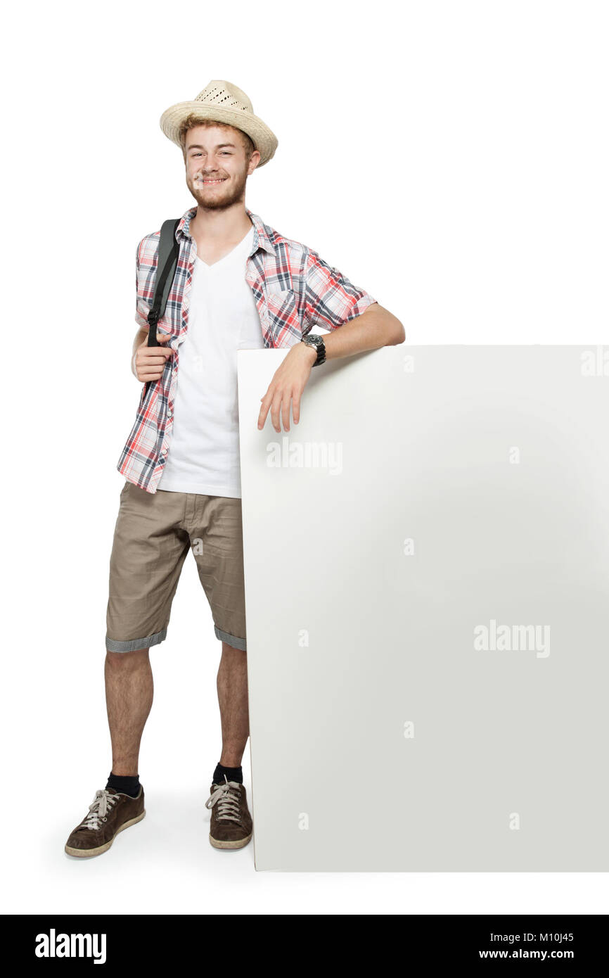 portrait of a young traveling man with backpack presenting with white ...