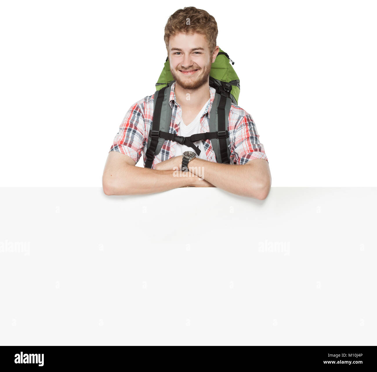 portrait of young man with backpack isolated over white background ...