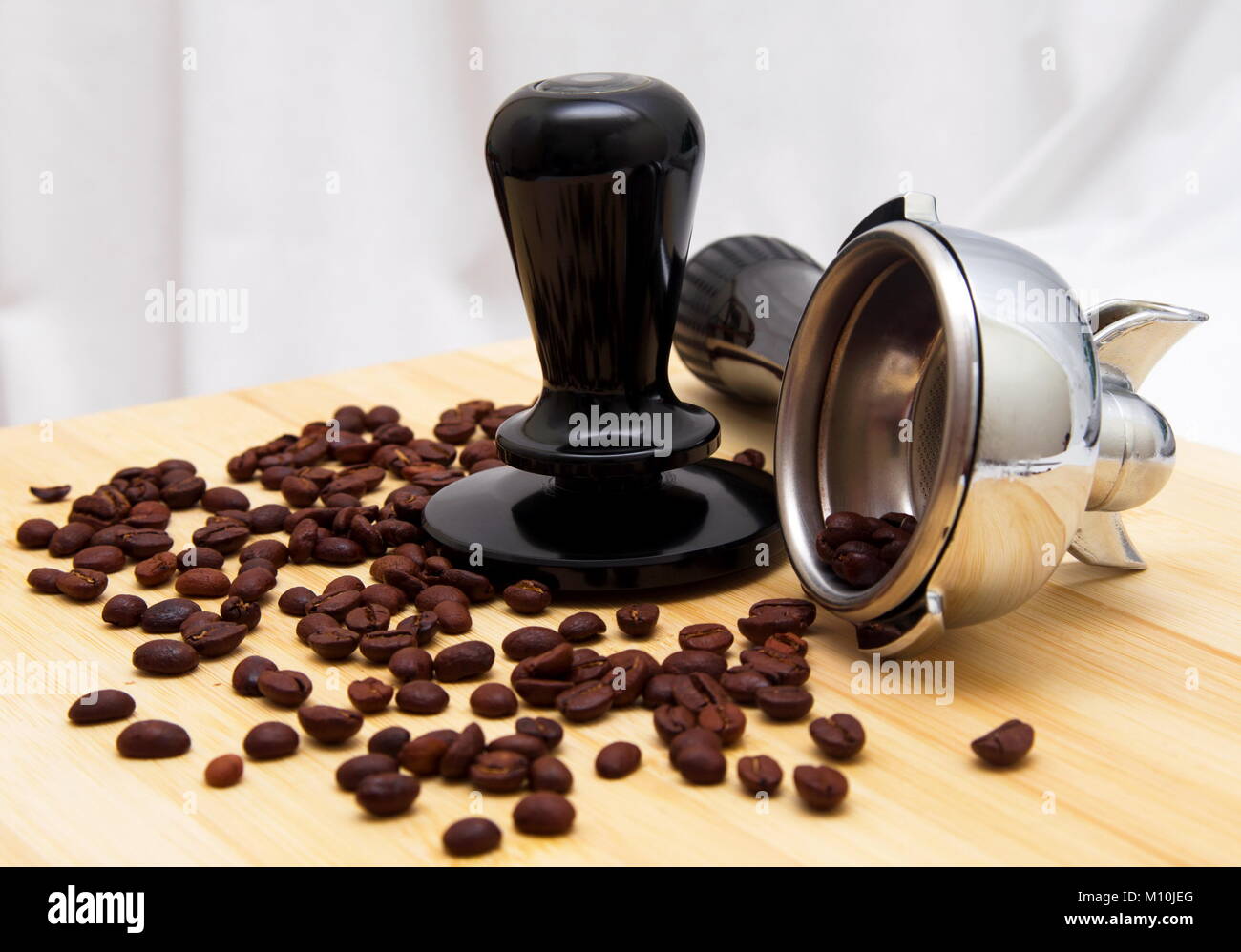 Grinder and filter for the coffee making Stock Photo Alamy