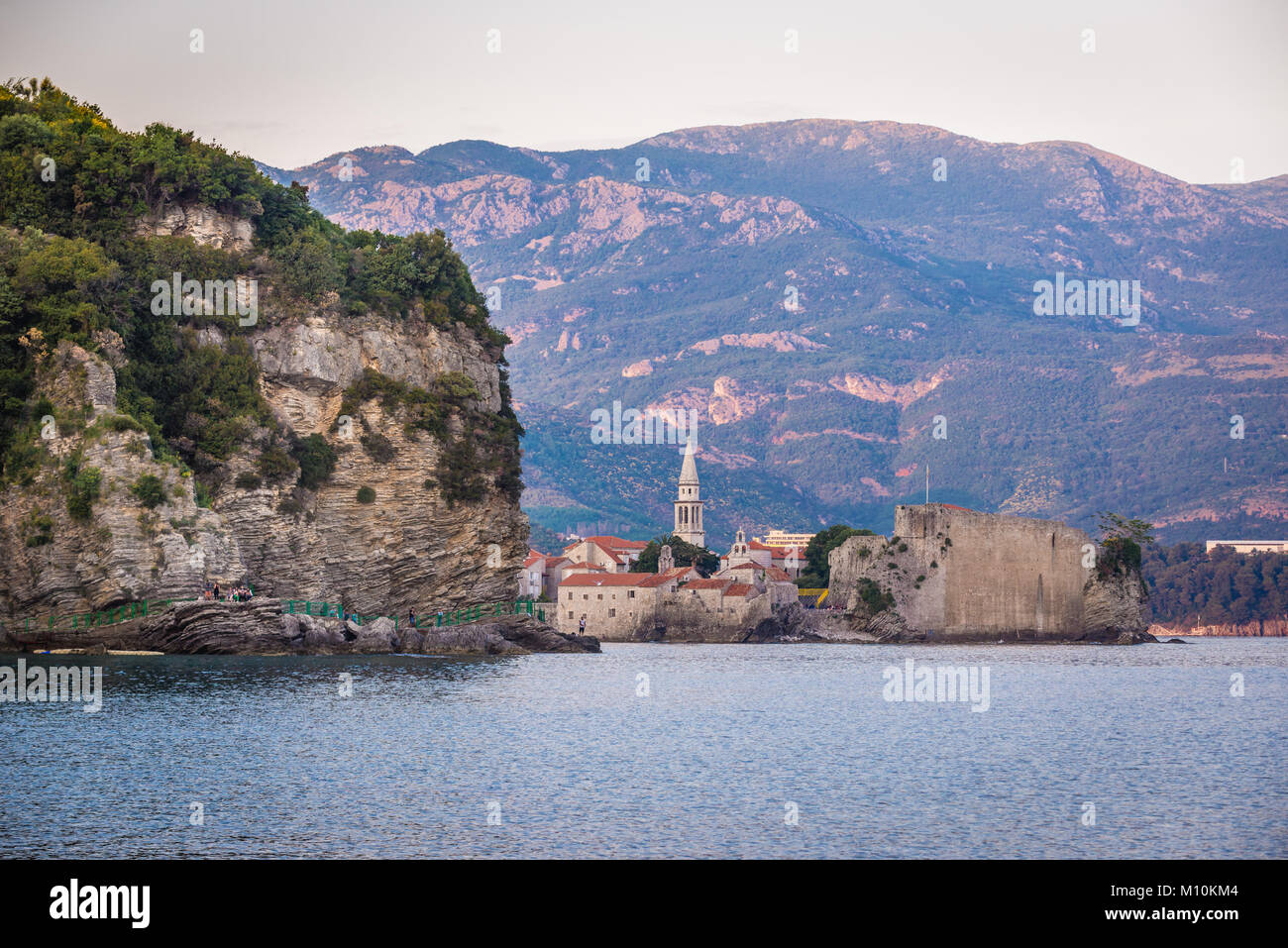 Old Town and rocky path to Mogren Beach in Budva city on the Adriatic Sea coast in Montenegro Stock Photo