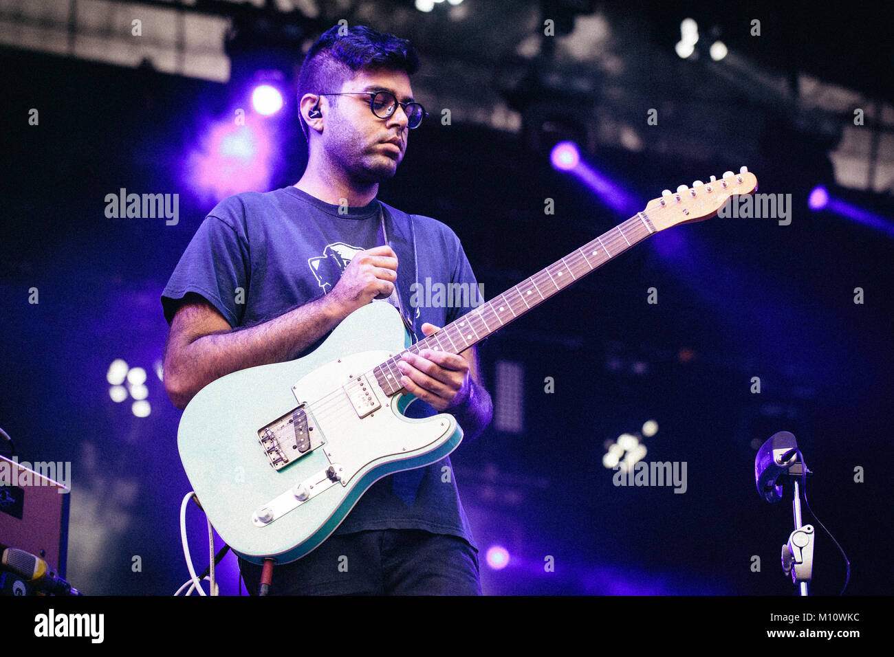 The American band Son Lux performs a live concert at the Polish music festival Off Festival 2015 in Katowice. The band consists of singer Ryan Lott, guitarist Rafiq Bhatia (pictured) and drummer Ian Chang. Poland, 09/08 2015. Stock Photo