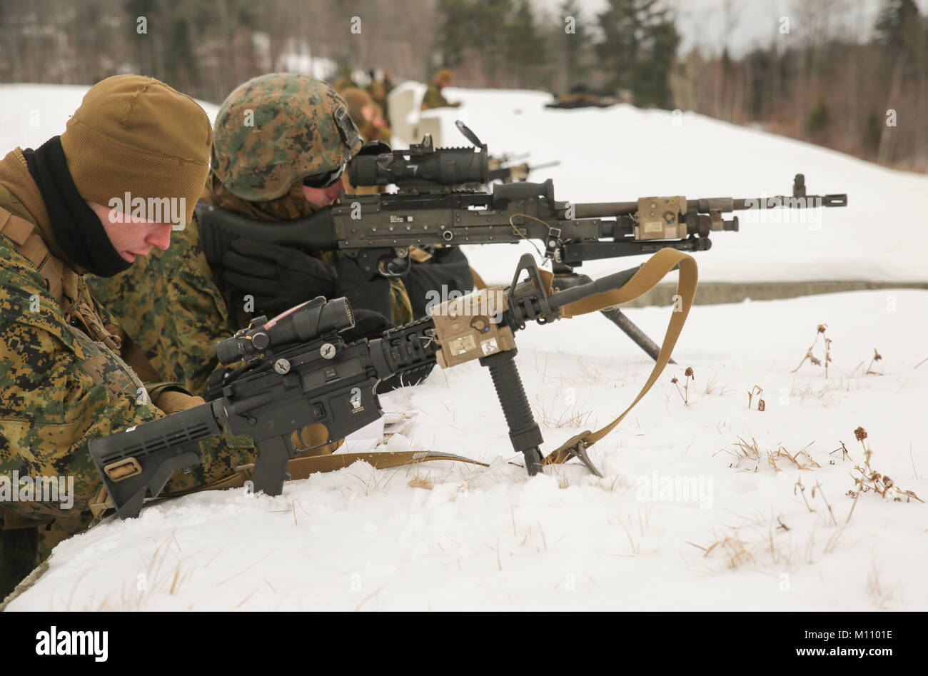 Marines with Company C, 1st Battalion, 24th Marines, 25th Marine Regiment, 4th Marine Division, conduct practical application techniques during exercise Nordic Frost at Camp Ethan Allen Training Site in Jericho, Vt., Jan. 20, 2018. The exercise allowed Marines to demonstrate their ability to operate in a cold weather mountainous environment, conducting land navigation, marksmanship training, demolitions, call for fire training and other core competencies. (U.S. Marine Corps photo by Pfc. Samantha Schwoch/released) Stock Photo