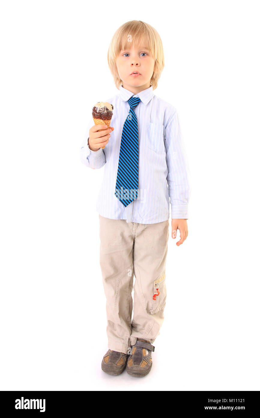 A Boy Wearing A White Shirt Is Eating Ice Cream Stock Photo