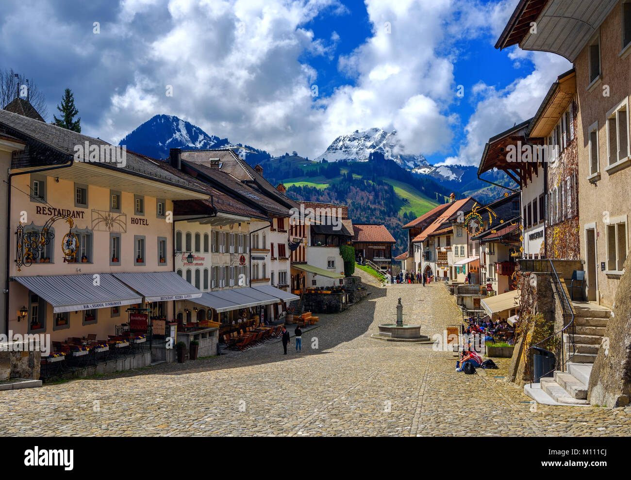 Gruyeres, Switzerland - April 14: The medieval Old Town of Gruyeres is an important tourist location and is name giving to the famous swiss Gruyere ch Stock Photo