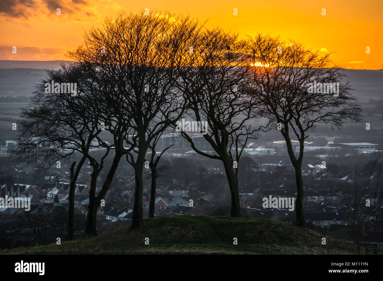 Sunset at the Seven Sisters round barrow, Copt Hill, near Houghton le Spring Stock Photo