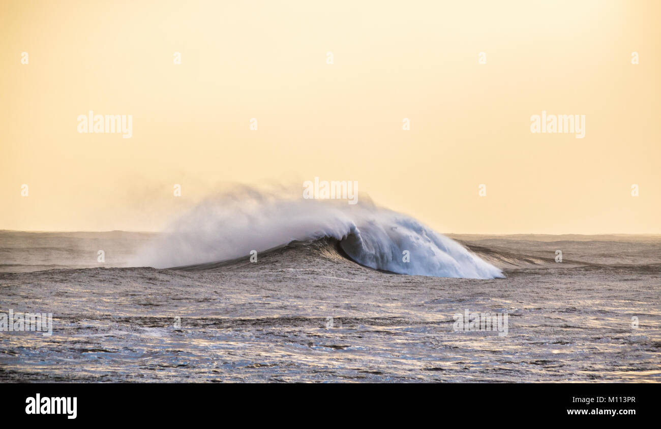 Big waves during a storm at dawn - Luanco, Asturias Stock Photo