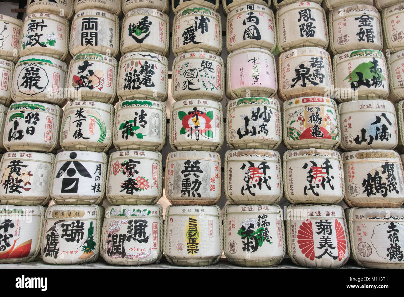 Barrels of sake wrapped in straw Stock Photo Alamy