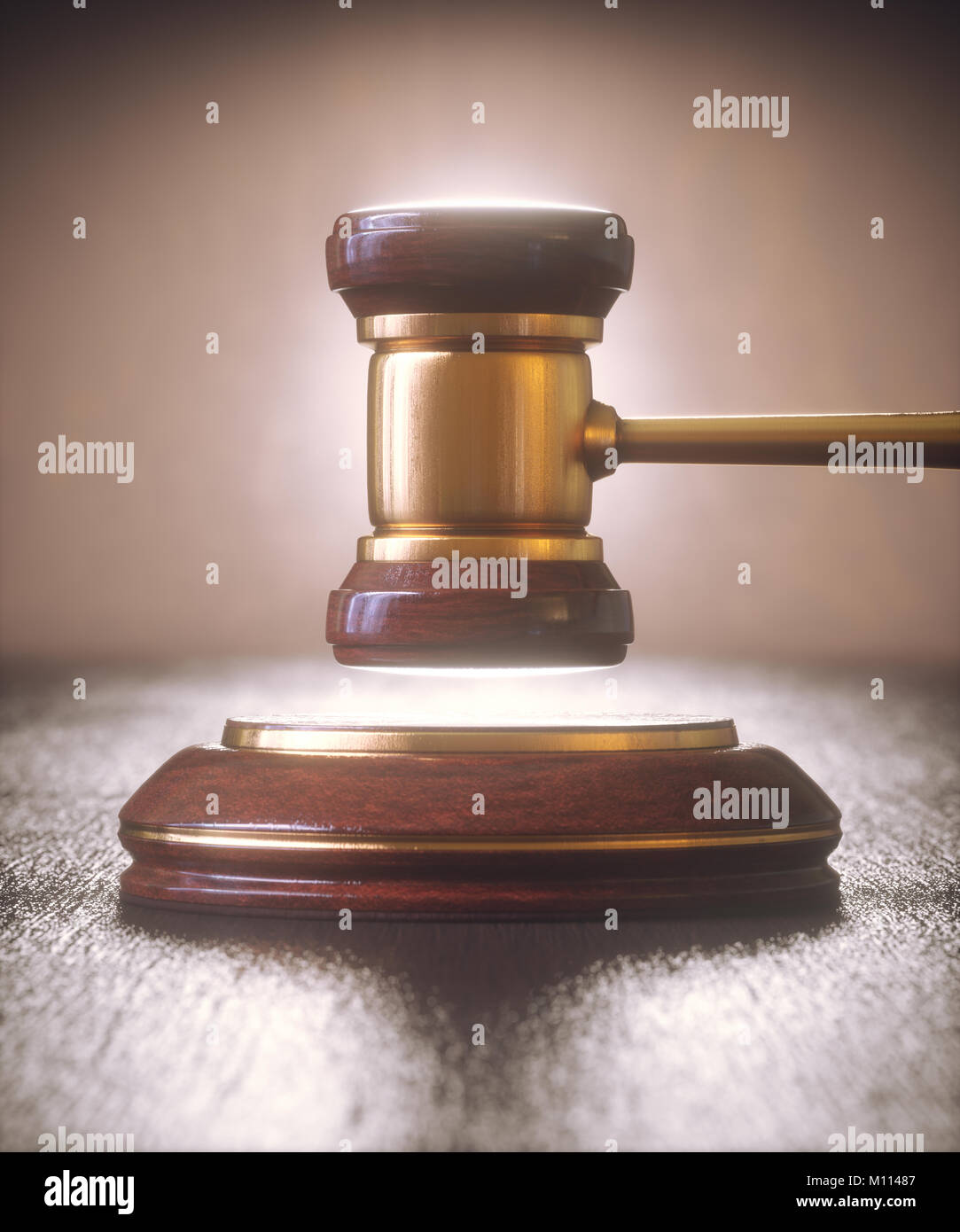 Gavel, judge hammer. Close up of wooden hammer with gold details. Concepts of law and auction. Stock Photo